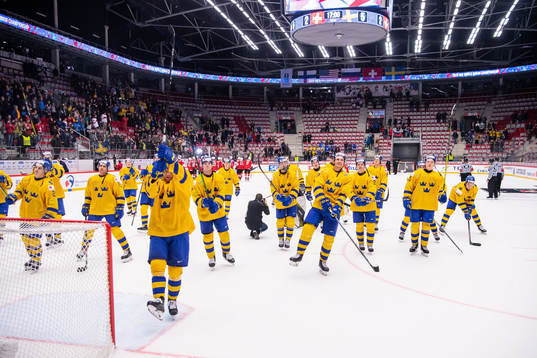 Players of Sweden celebrate