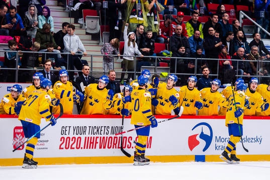 Karl Henriksson of Sweden celebrate with teammates