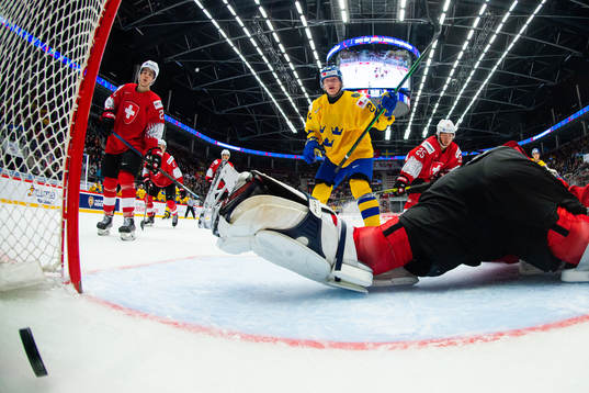 Karl Henriksson of Sweden scores the 0-4 goal