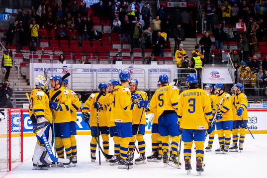 Players of Sweden celebrate