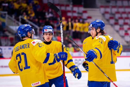 Samuel Fagemo celebrate with Nils Lundkvist and Nils