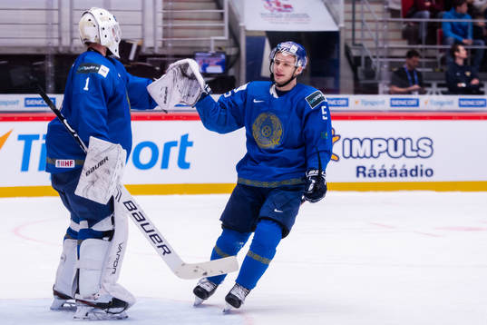 Goalkeeper Vladislav Nurek and Oleg Boiko of Kazakhstan