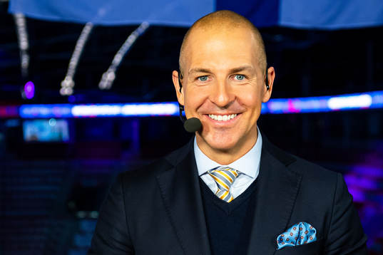 Erik Granqvist of Swedish broadcaster Viasat pose for a