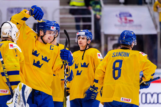 Adam Ginning of Sweden celebrate with teammates