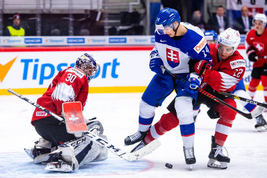 Dominik Jendek of Slovakia against goalkeeper Luca