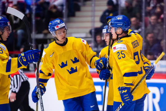 Philip Broberg and Linus Öberg of Sweden celebrate