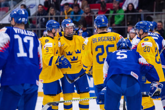 Victor Söderström and Alexander Holtz of Sweden celebrate
