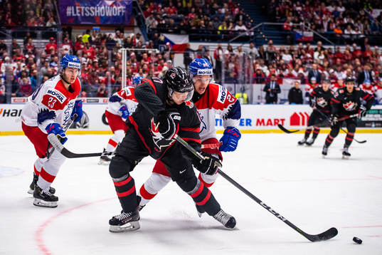 Connor McMichael of Canada and Adam Raska of Czech Republic
