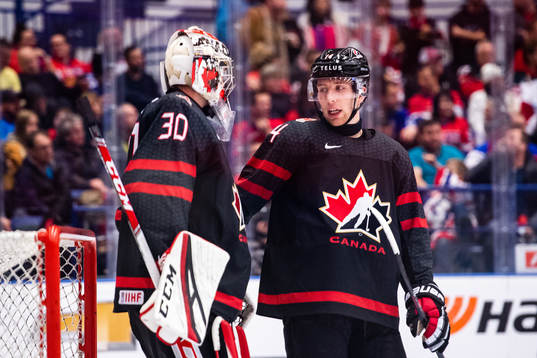 Goalkeeper Joel Hofer and Jared McIsaac of Canada
