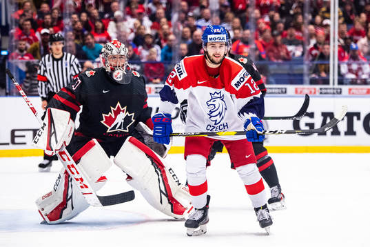goalkeeper Joel Hofer of Canada and Vojtech Strondala of