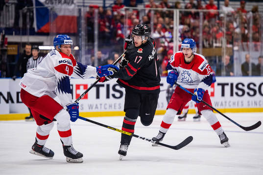 Connor McMichael of Canada against Radek Kucerik and Ondrej
