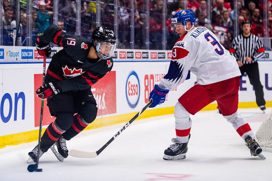 Quinton Byfield of Canada and Karel Klikorka of Czech