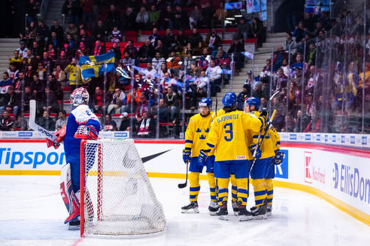 Players of Sweden celebrate