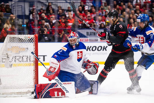 Joe Valeno of Canada against goalkeeper Samuel Hlavaj and