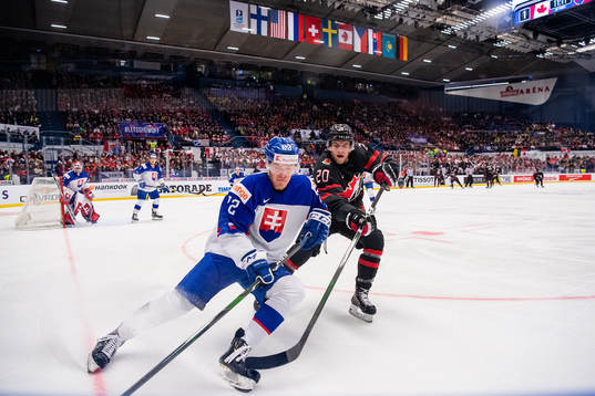 Oliver Turan of Slovakia and Dawson Mercer of Canada