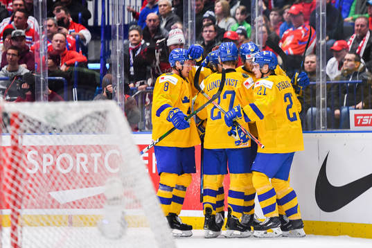 Nils Höglander of Sweden celebrate with teammates