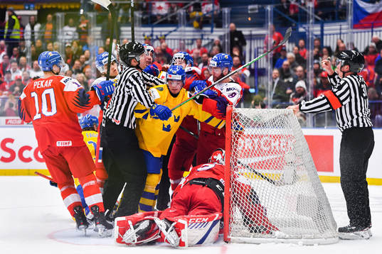 Nils Höglander of Sweden against players of Czech Republic