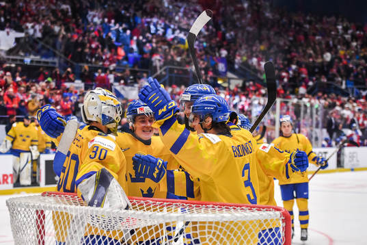 Players of Sweden celebrate