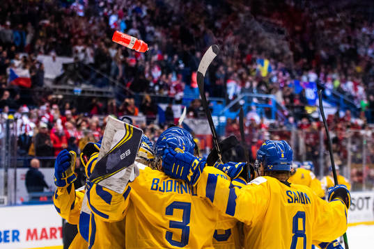 Players of Sweden celebrate