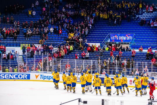 Players of Sweden celebrate