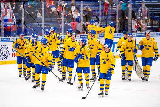 Players of Sweden celebrate