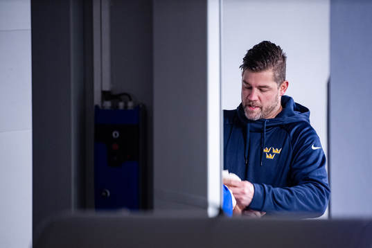 Ryan Allenby, Doctor of Sweden, gives medical care to