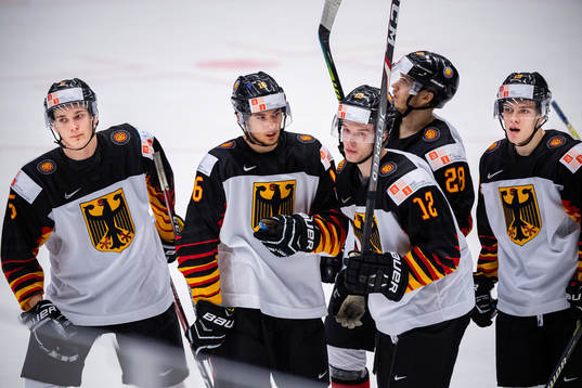 Nino Kinder and Luis Schinko of Germany celebrate the 4-1