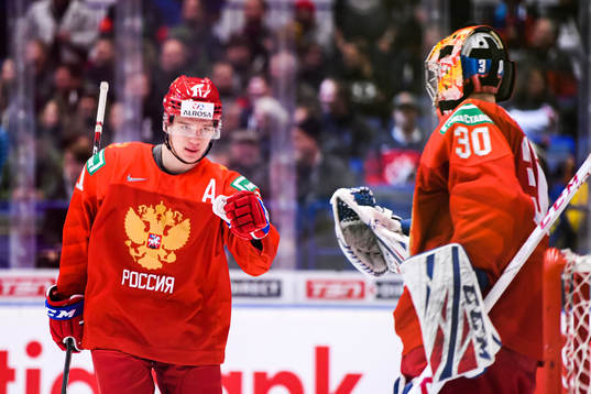 Vasili Podkolzin and goalkeeper Yaroslav Askarov of Russia