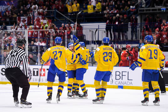 Samuel Fagemo of Sweden celebrate with teammates