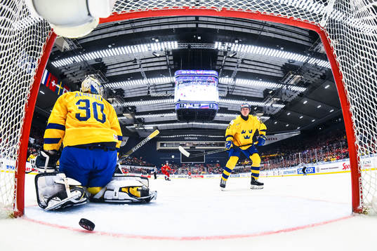 Ivan Morozov of Russia scores 1-1 behind goalkeeper Hugo