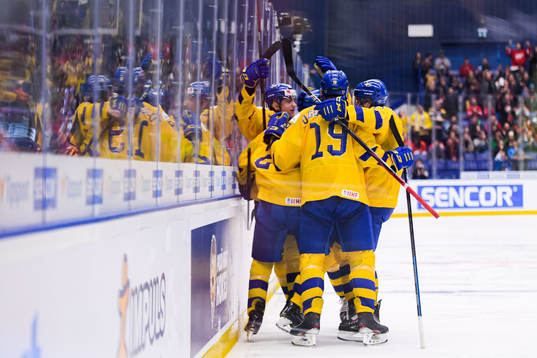 Nils Lundkvist of Sweden celebrate with teammates