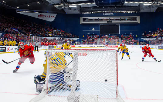 Ivan Morozov of Russia scores 4-5 behind goalkeeper Hugo