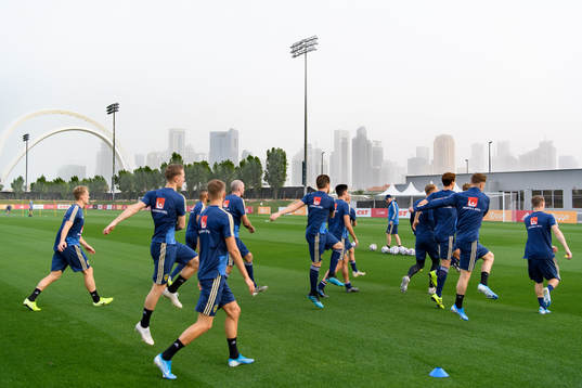The Doha skyline in the background
