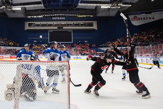 Aidan Dudas and Ty Dellandrea of Canada celebrate the 4-0