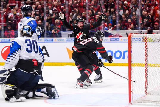 Aidan Dudas and Ty Dellandrea of Canada celebrate