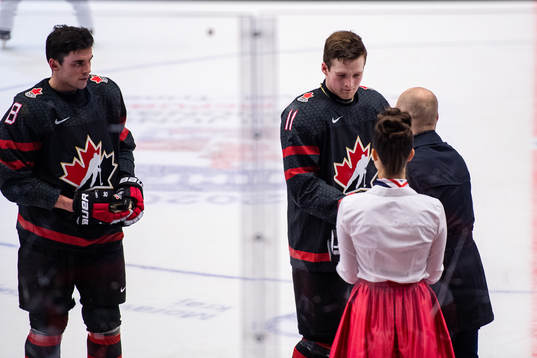 Liam Foudy and Alexis Lafreniere of Canada