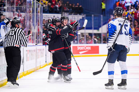 Jamie Drysdale of Canada celebrates