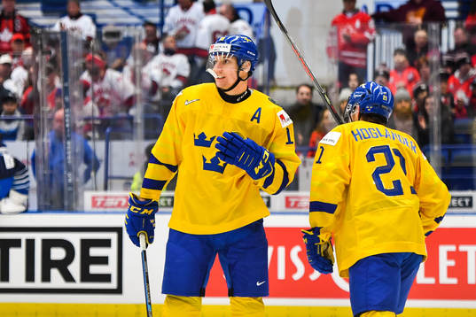 David Gustafsson and Nils Höglander of Sweden look dejected