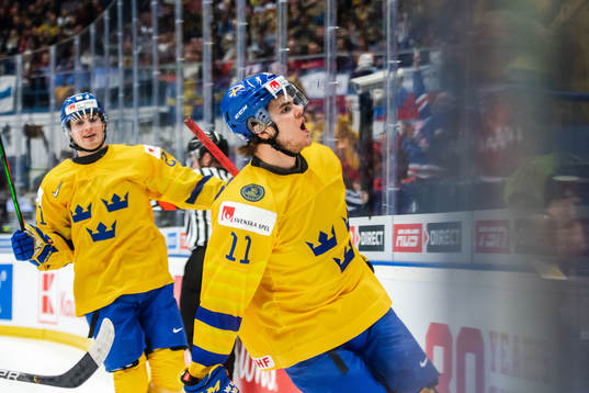 Nils Höglander and Samuel Fagemo of Sweden celebrate