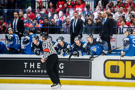 Players of Finland and Raimo Helminen, head coach reacts
