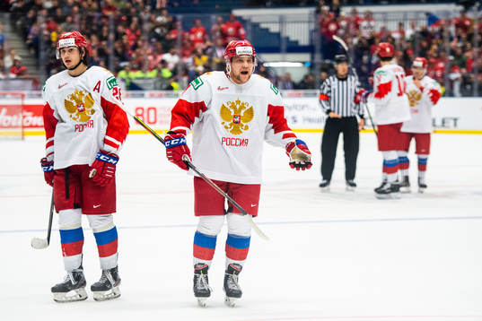 Alexander Romanov and Alexander Khovanov of Russia react