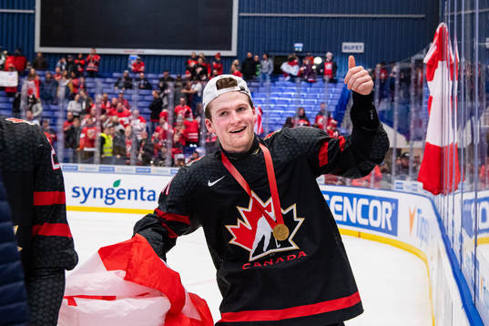 Alexis Lafreniere of Canada celebrates