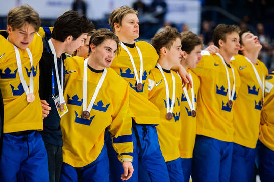 Nils Höglander of Sweden celebrate with teammates