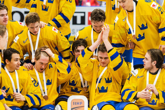 Players of Sweden celebrates