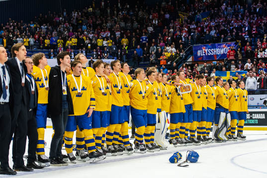 Players of Sweden celebrate