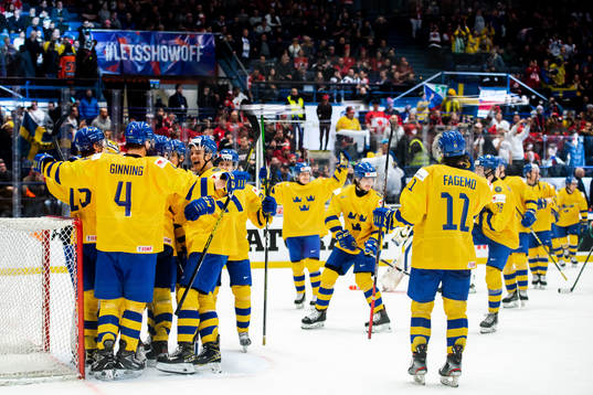 Players of Sweden celebrate