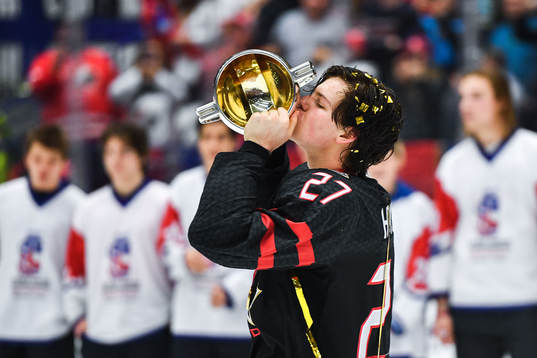 Barrett Hayton of Canada celebrate with the trophy