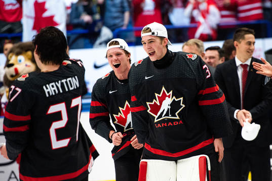 Goalkeeper Joel Hofer of Canada celebrates
