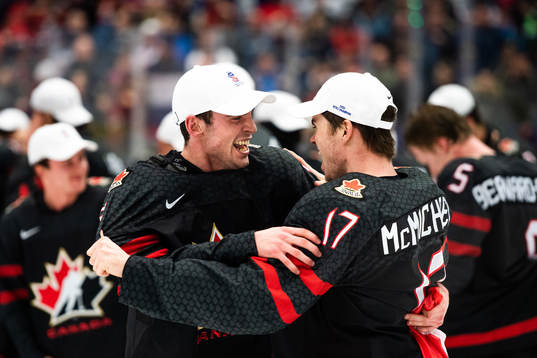 Liam Foudy and Connor McMichael of Canada celebrate