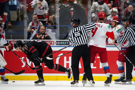 Barrett Hayton of Canada and Yegor Zamula of Russia